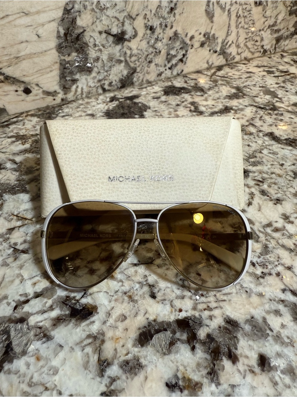 Michael Kors Silver Aviator Sunglasses with yellowish goldish lens
